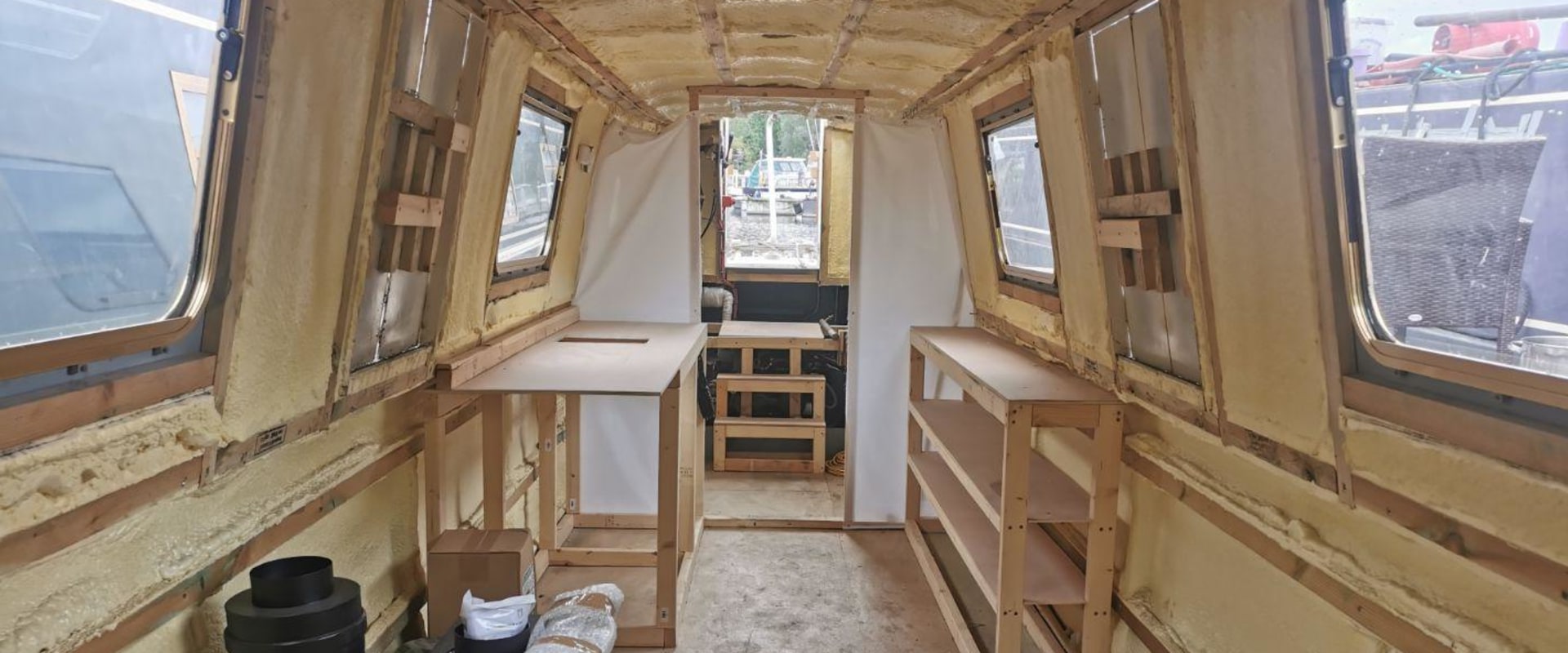 What is the traditional layout of a narrowboat?