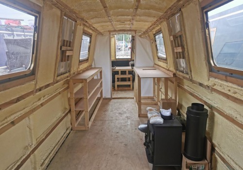 What is the traditional layout of a narrowboat?